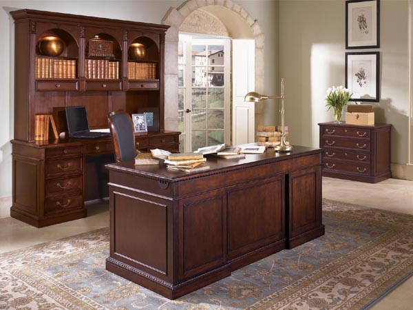 wellington from dmi office furniture executive suite consisting of double ped desk, credenza, hutch and two drawer lateral file.