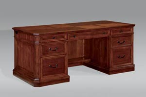 Executive desk with full pedestals and center drawer.