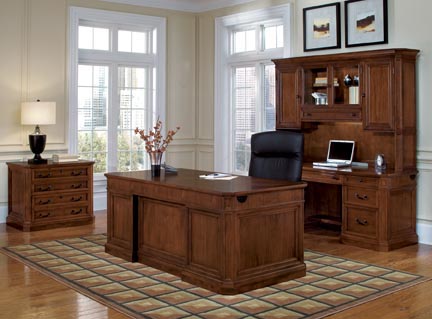 Executive desk, kneehole computer credenza, overhead storage hutch lateral file in Medium Walnut finish on hardwood veneers.