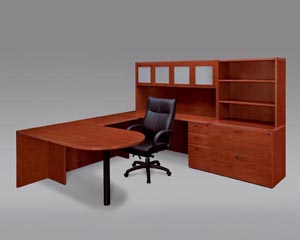 Free standing penninsula table "U" desk with box/box/file full pedestal, white glass door storage hutch and lateral file with hutch shown in Cognac Cherry finish.