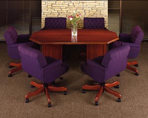 Large traditional octagon conference table with upholstered low back executive chairs