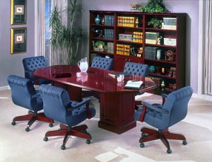 Traditional racetrack conference table with low back upholstered chairs