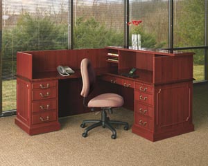 Traditional reception "L" desk with transaction counter working side view