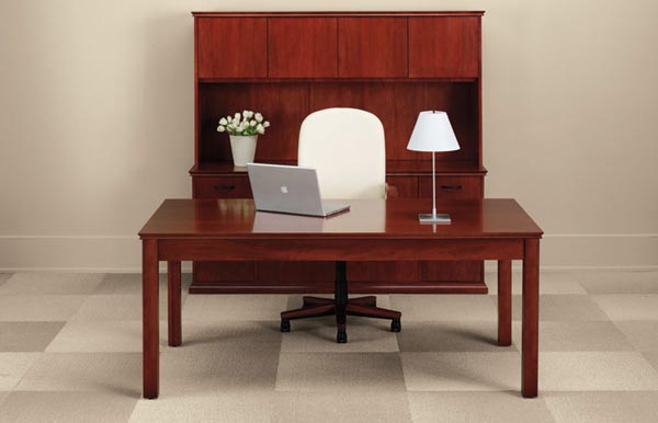 Executive transitional table desk with storage credenza and storage hutch with doors.