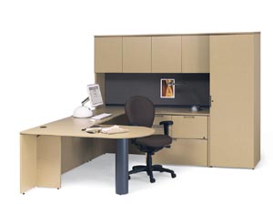 Peninsula worksurface "U" desk with lateral credenza, covered overhead hutch, tack board and wardrobe cabinet