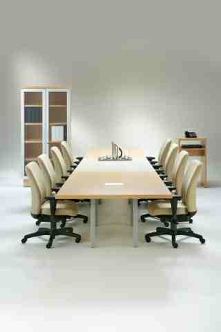 multiple rectangular tables with complementary furniture