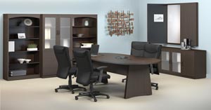 Conference room suite consisting of race track conference table, buffet, conference cabinet with white erase board, two bookcases and a storage bookcase cabinet with frosted panel doors shown in the Mocha laminate finishes.