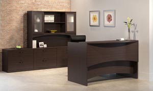 Reception desk with double lateral credenza with overhead hutch with double height frosted panel doors and additional two drawer lateral