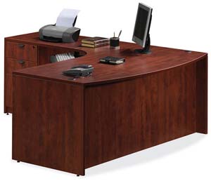 Bow front executive "L" desk with two box/box/file pedestals. 