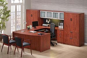 Bow front executive "U" desk with storage hutch with aluminum and frosted panel doorsand lateral file storage cabinets. 