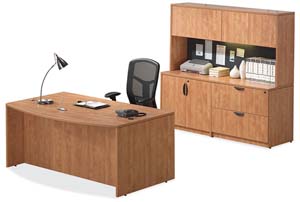 Bow front executive desk, storage lateral file credenza with storage hutch and tack board. 