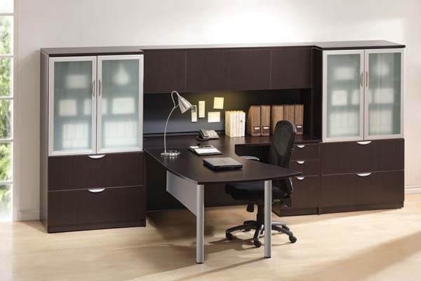 Arc table "L" desk with wall unit consisting of storage hutch with doors and two lateral file storage cabinets with silver trimmed doors and frosted glass. 