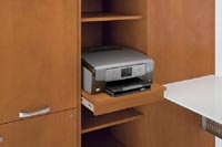 The Technology Cabinet’s pull-out shelf is for laser printers or multifunction devices, with adjustable open shelving above and below