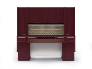 Fuse Desk and Credenza shown in Mahogany on Cherry with Shark edge and Rod pulls in Matte Chrome