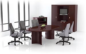 Racetrack conference table with half round bases, audio/visual cabinet and wardrobe/storage cabinets. 