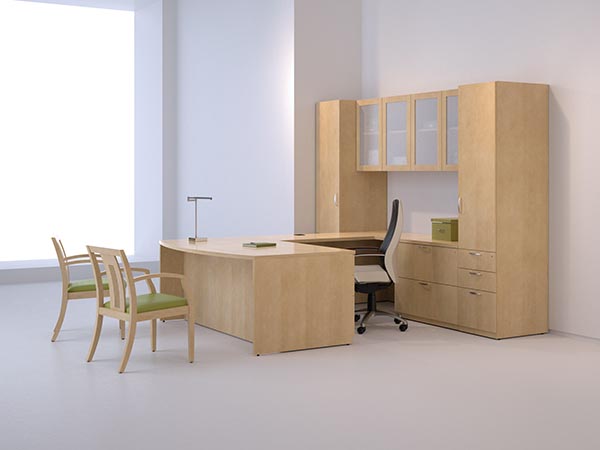 Ignite's executive bow front "U" desk with lateral file drawers, vertical pedestal storage cabinet and a wardrobe cabinet with overhead hanging frosted glass door storage. 