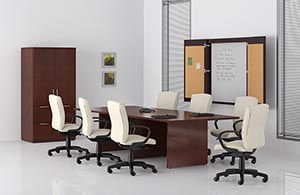 Rectangular conference table with two drawer lateral file with audio/visual cabinet on top and presentation board.